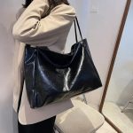 grand sac à main pour les cours en cuir noir